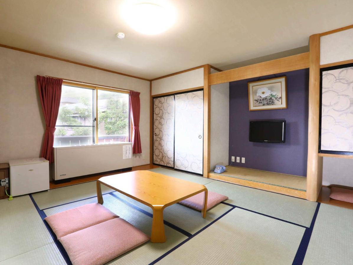 志贺市井酒店 山之內 外观 照片