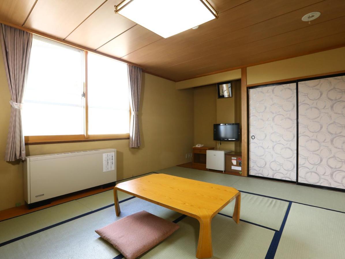 志贺市井酒店 山之內 外观 照片