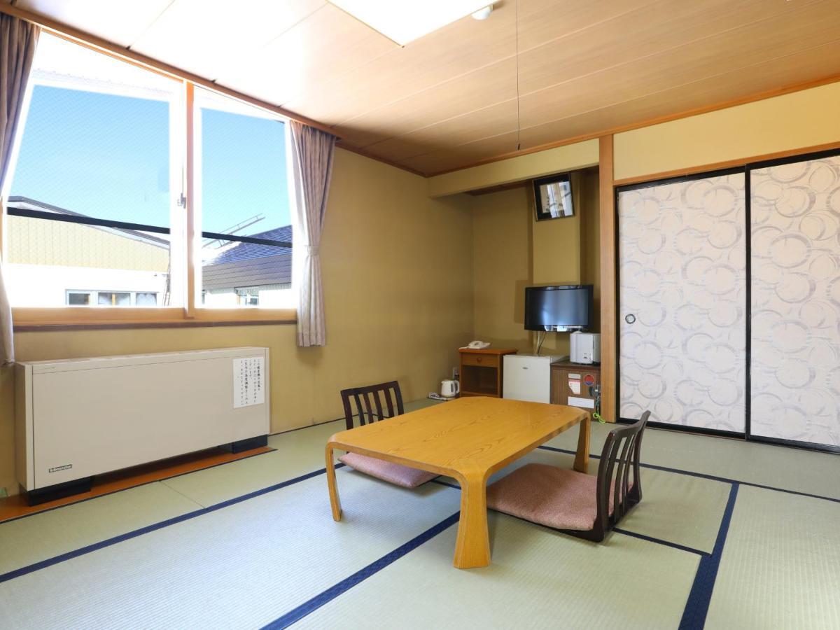 志贺市井酒店 山之內 外观 照片
