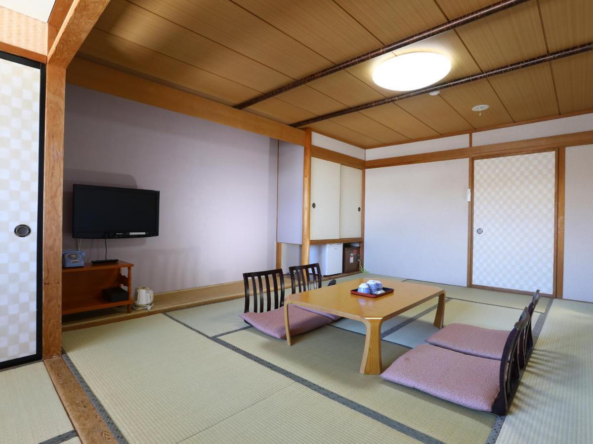 志贺市井酒店 山之內 外观 照片