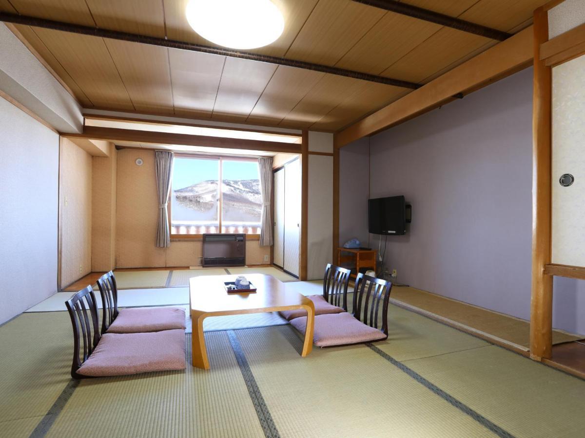 志贺市井酒店 山之內 外观 照片