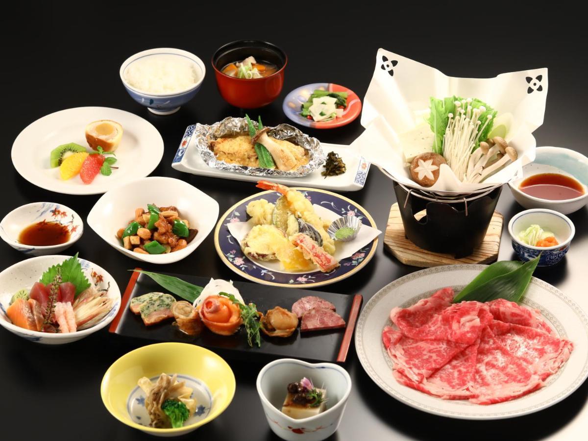 志贺市井酒店 山之內 外观 照片