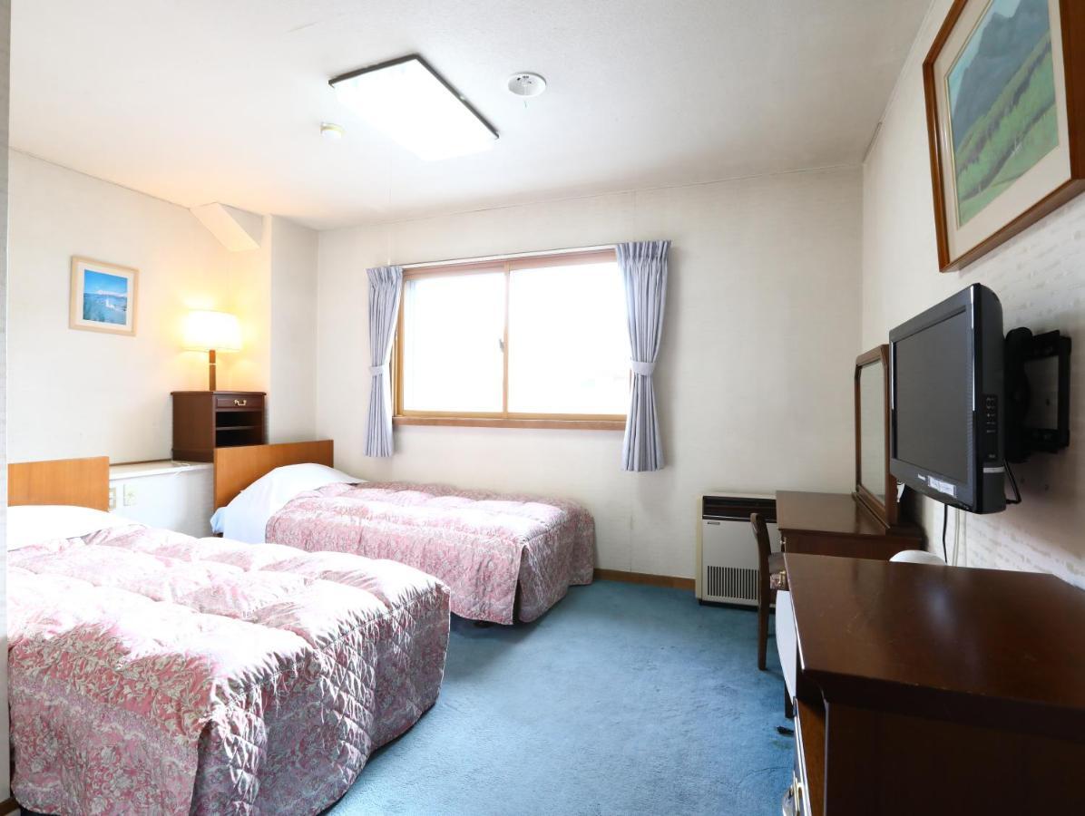 志贺市井酒店 山之內 外观 照片
