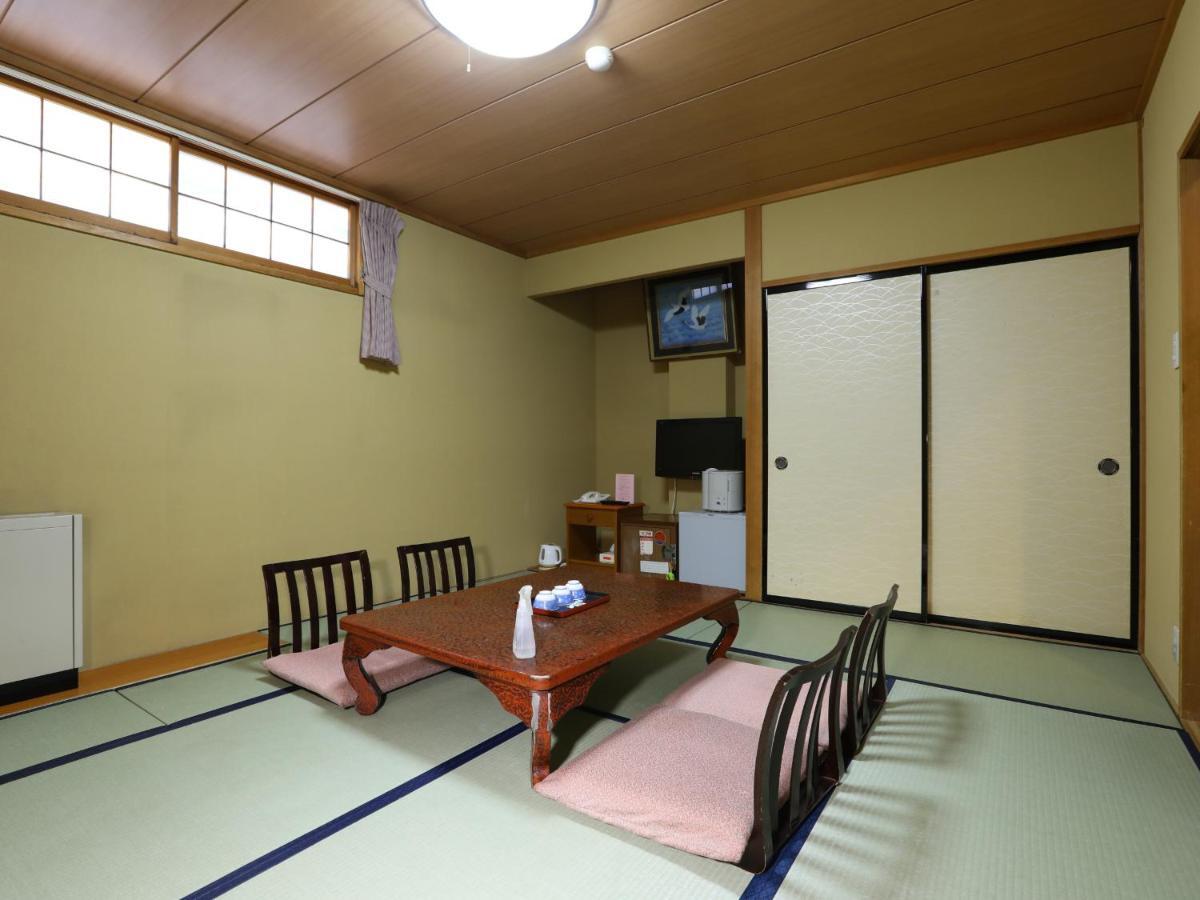 志贺市井酒店 山之內 外观 照片