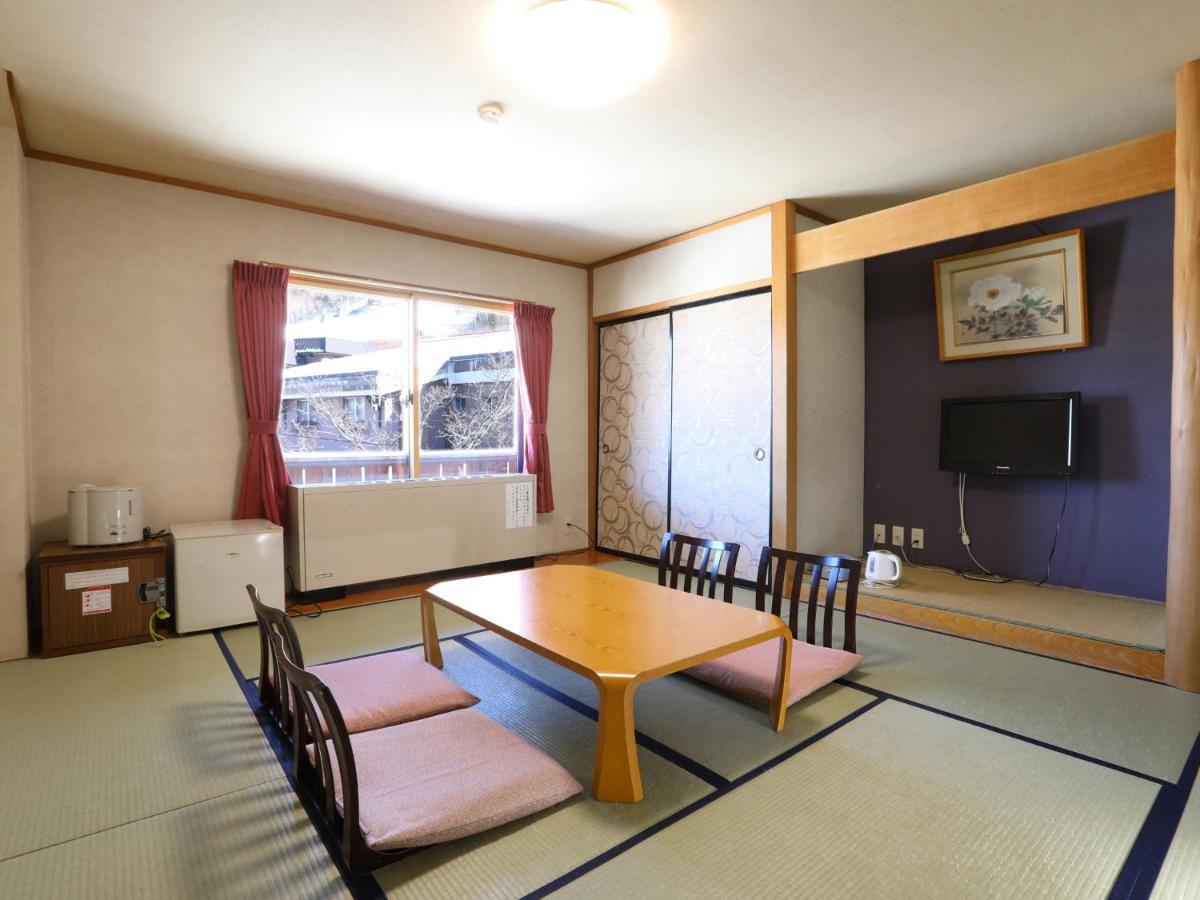 志贺市井酒店 山之內 外观 照片